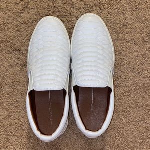 White slip on shoes